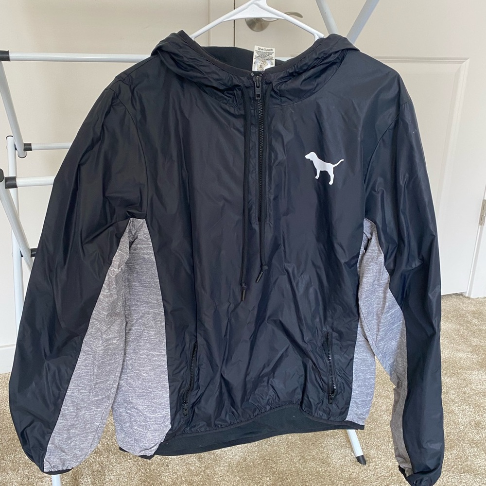 Quarter zip VS Pink rain jacket